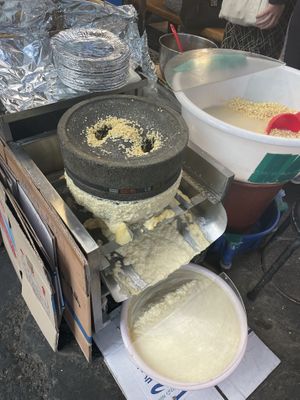 How mung beans are grinded   at Kwangjang Market in Seoul