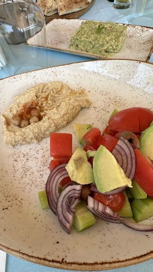 Салата и хумус 👌  at Restaurant Sacré in Nessebar