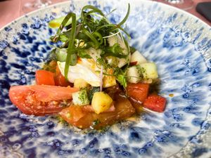 Gemarineerde tomaatjes 'burrata'  Thaise dressing  frisse kruiden  watermeloen  ananas at Eethuis Lamoen in Landegem