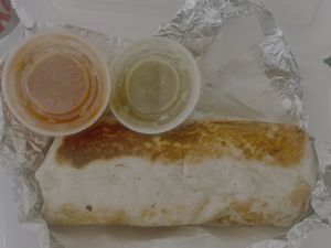 Two burritos only came with two sauces but they were tasty just wish I had moree  at La Familia Cafe in Kalamazoo