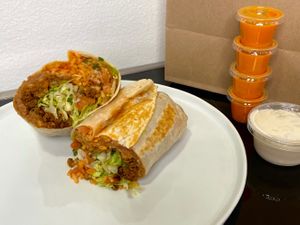 Impossible burrito (cut in half + plated at home) at Taco City in Seattle