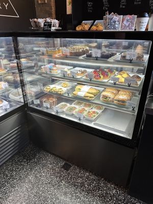 Some of the selection of tarts and cakes and savoury sandwiches   at Made with Love Bakery in Southport