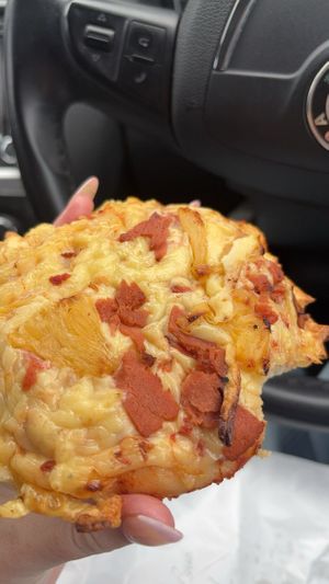 Mini ham pineapple pizzaa  at Made with Love Bakery in Southport