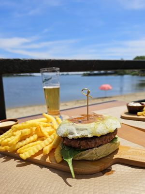The vegan burger (I asked for no cheese, but they have vegan cheese). at Rïa Lounge Bar in Ovar