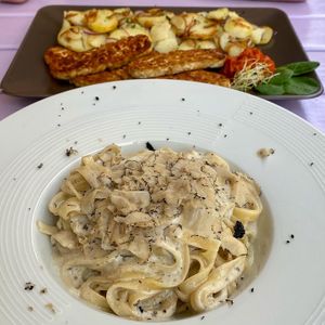 Pasta with tartufata & baked tempeh with potatoes at Artha in Porec