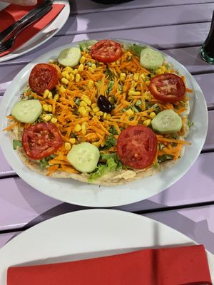 Naan bread with hummus and vegetables at Artha in Porec