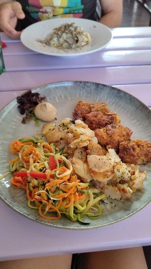 Steak with fried potatoes and vegetable noodles at Artha in Porec