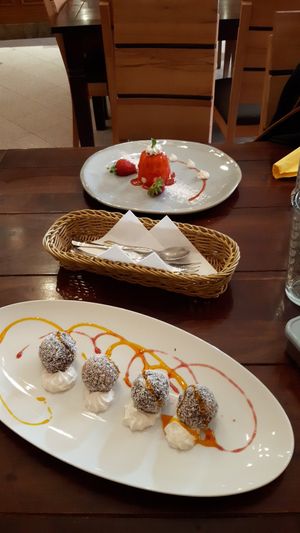 Delicious dessert: vegan energy balls and pannacotta at Artha in Porec