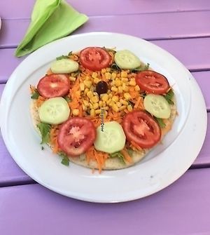 Naan with hummus and vegetables at Artha in Porec