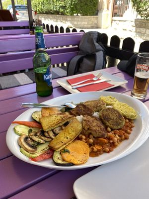 Platter for two with seitan in tempura, soy cutlets, tofu and chickpea stew as well as grilled veggies - tasty but not mindblowing. Appreciate the variety of protein & little oil  at Artha in Porec