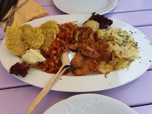 Soy medaillons, fried seitan, legumes & braised potatoes (for two) at Artha in Porec