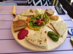 Artha platter. Spreads: hummus, red beet, spinach, tofunaise & legumes. at Artha in Porec