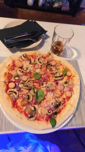 Pizza boscaiola at Ca La Mora Italian Restaurant in Barao De Sao Joao