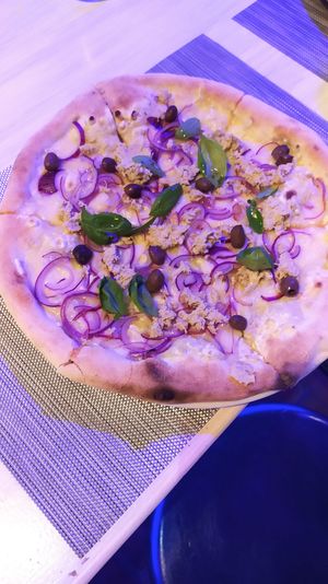 Pizza tonno e cipolle at Ca La Mora Italian Restaurant in Barao De Sao Joao