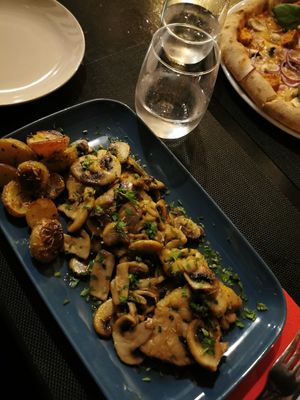 Mushroom escalopes with potatoes at Ca La Mora Italian Restaurant in Barao De Sao Joao