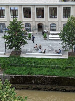 Outdoor seating. View from across the river. at Grashka Deli in Ljubljana