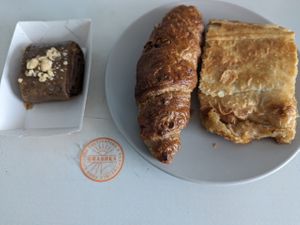 Hazelnut roll, croissant, apple strudel at Grashka Deli in Ljubljana