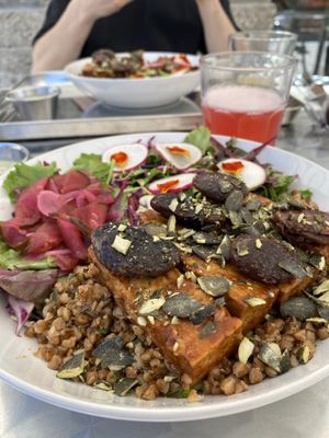 Protein bowl with tempeh buckwheat beans, and a tasty dressingg  at Grashka Deli in Ljubljana