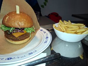 Vegan burger and fries at Grashka Deli in Ljubljana