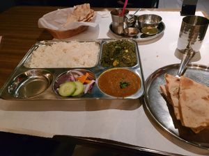 Thali (Platter) with Saag Tofu curry,  rice, lentil soup,  and salad. at Naan Point in San Bruno