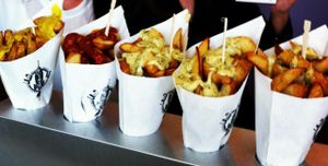 Baked organic fries cone in biodegradable bamboo with a variety of vegan and GF sauces at 3 Potato 4 New Orleans in New Orleans