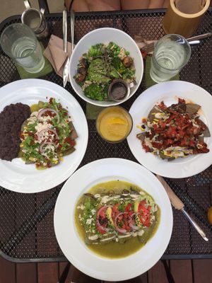 chillaquiles w/chickpea chorizo (left) jackfruit nachos (right) (top)salad. (bottom) entomadas.  at La Senda Restaurante in Playa Del Carmen