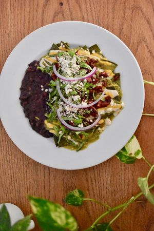 Chilaquiles con pastor  at La Senda Restaurante in Playa Del Carmen