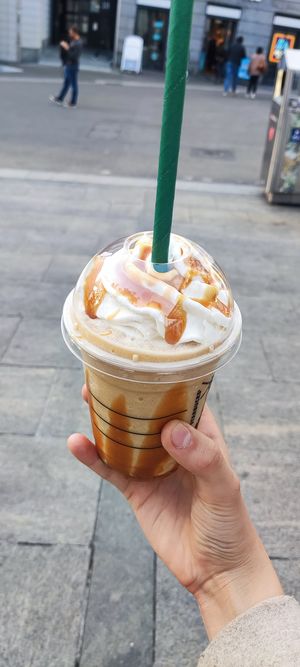 Vegan caramel, decaf coffee with whipped cream at Starbucks - Stadelhofen in Zurich