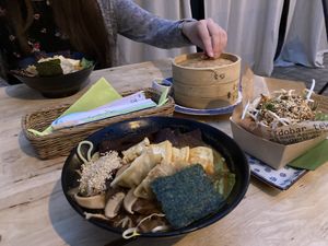 Vegan pod norenami ramen, momo dumplings and a Seoul gua bao  at Pod Norenami in Krakow