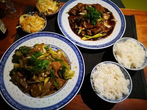 two faux-beef main courses plus sides at Pod Norenami in Krakow