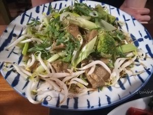 Garlic beef strips with veggies at Pod Norenami in Krakow