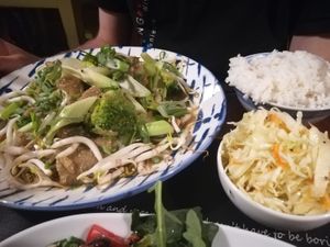 Garlic beef strips + veggies, rice and pickled cabbage at Pod Norenami in Krakow