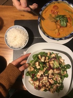 Tofu salad (too oily) and red curry with vegan ”beef" at Pod Norenami in Krakow