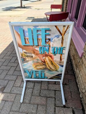 Sign in front of building at Vice Burger  in Fort Worth