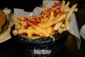 Chips with cheese and 'bacon' bits at Foodswings in Brooklyn