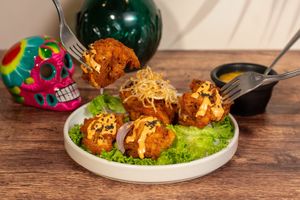 Rock Cauliflower with Mango-Habanero sauce

(Chipotle mayo dressing can be removed upon request.) at Santo Habanero in Mexico City