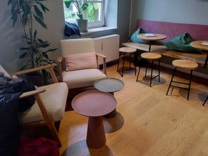 A cozy corner in the cafe at DUUO in Munich