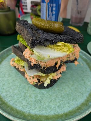 Carrot and olive with activated charcoal bread at Manga Rosa in Lisbon