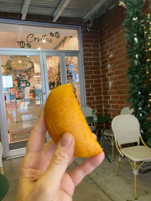 Bean empanada; front of cafe. This gives you an idea of the size of the empanada. at Cositas Cafe in New York City