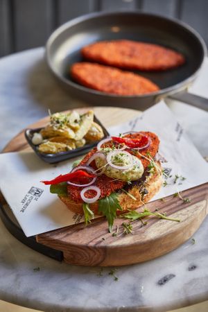 Broodje Hongaarse Schnitzel | Remoulade | Gekonfijte Paprika  at De Vegetarische Slager Shop in Rotterdam
