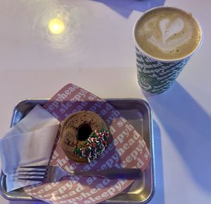 Peppermint Mocha Doughnut and Stay Salty Blitzen latte    at Sleepyhead Coffee - Main St in Chattanooga