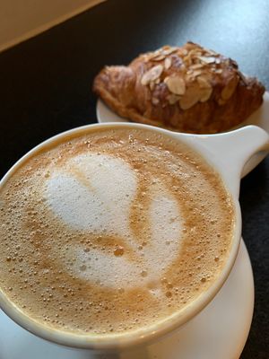 Oatmeal latte and vegan almond croissant   at Coffee Fox in Savannah