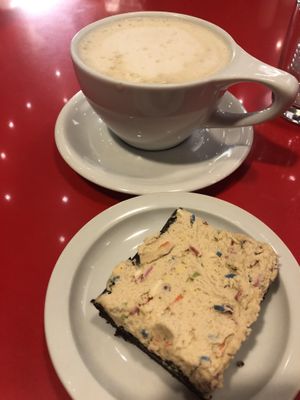Vegan latte w/ oat milk and a vegan cookie dough brownie  at Coffee Fox in Savannah