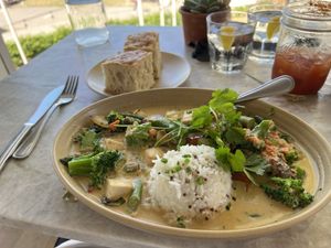 Coconut curry: summer vegetables, coconut curry sauce, quinoa rice  at Malibu Farm in San Diego