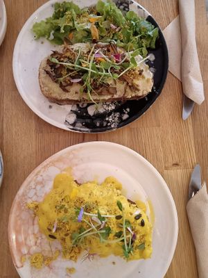 Mushroom toast & Benedict. at Pequeno Café e Bistrô - Príncipe Real in Lisbon