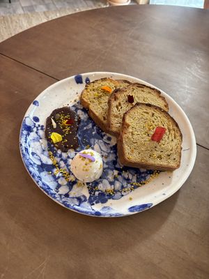 Toasted brioche bread with homemade Butter & Jam  at Pequeno Café e Bistrô - Príncipe Real in Lisbon