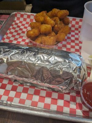 Vegan cheese steak and tots at Vegan Junk Food DMV - Ghost Kitchen in Silver Spring