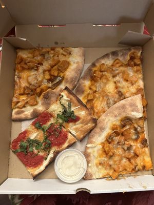 Buffalo seitan and margarita slices  at Bella Napoli  in Copiague