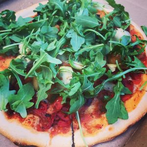 Roasted garlic, artichoke, arugula pizza (no cheese) at Salt Shaker Deli in Lunenburg