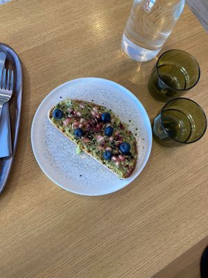 Toast with edible flowers, very tasty at MUTO in Madrid